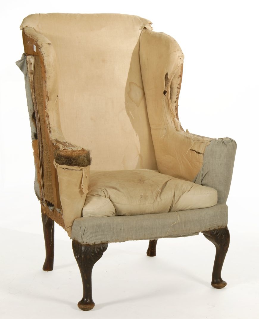 Appraisal: ANTIQUE GEORGIAN WING CHAIR th CenturyWith diminutive wing back and