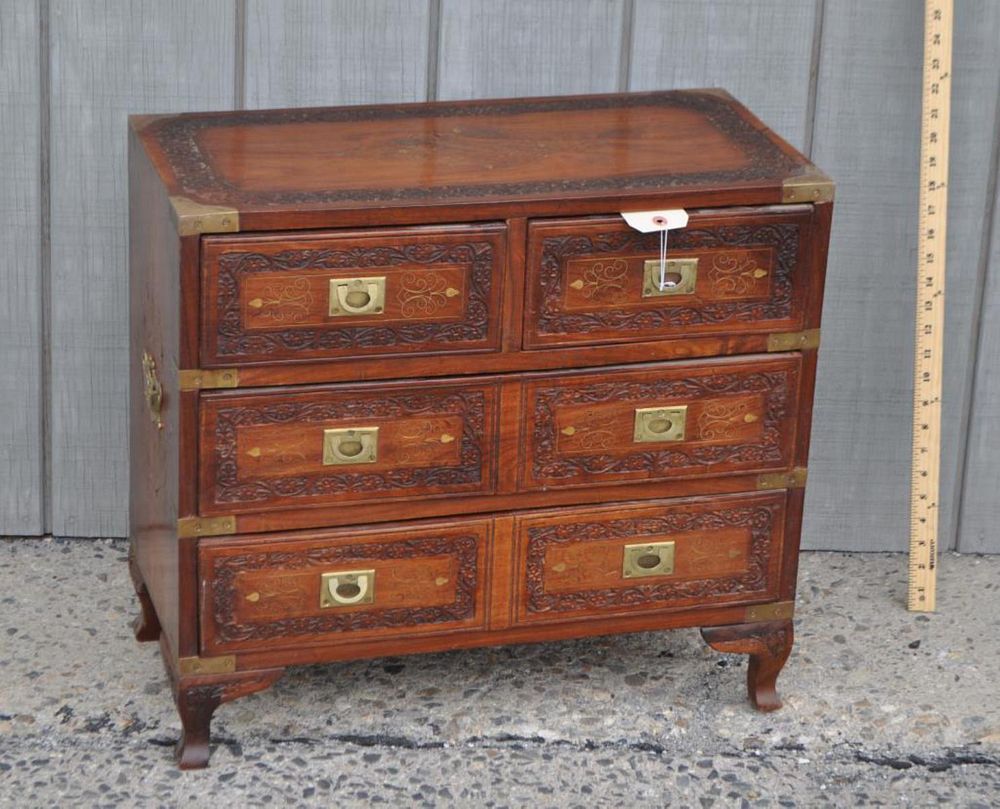 Appraisal: Indian Carved Brass Inlaid Child's Bureau with two short over