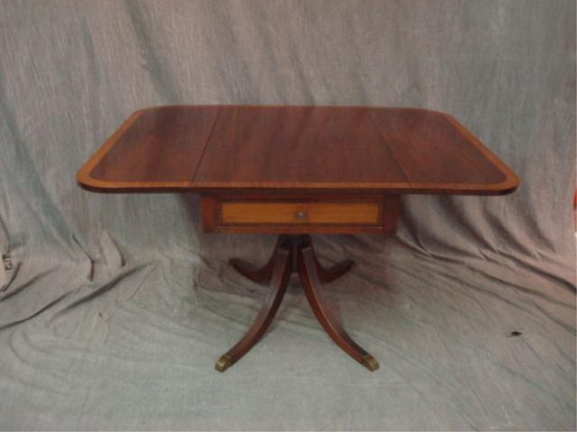 Appraisal: CHARAK signed banded drop leaf dining table with one drawer