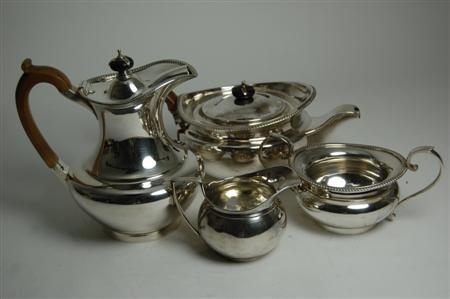 Appraisal: A composite silver tea service comprising a teapot London of