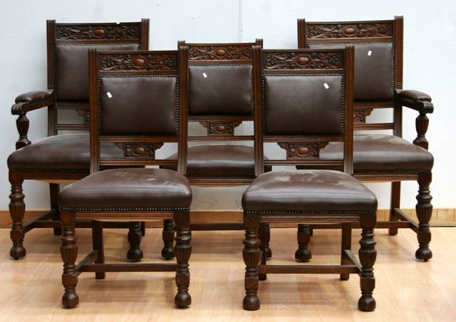 Appraisal: A set of eight Victorian oak and leather upholstered dining