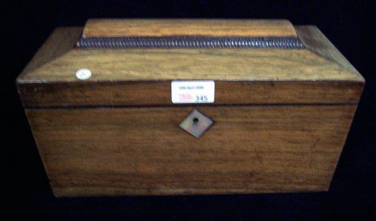 Appraisal: A Regency rosewood sarcophagus shaped tea caddy with knulled moulding