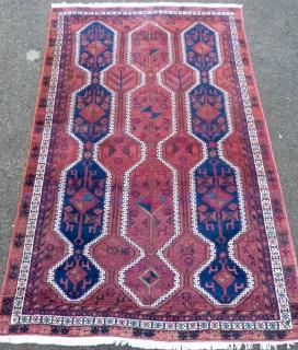 Appraisal: Persian type red ground rug the cream border with repeating