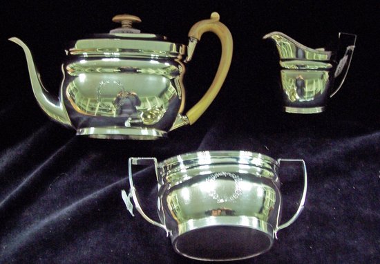 Appraisal: A George III oval teapot with shaped spout hinged cover