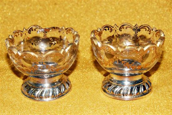 Appraisal: PAIR ANTIQUE CONTINENTAL MASTER SALTS With silver base repaired D