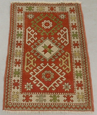 Appraisal: - Kazak oriental hall mat with red field and overall