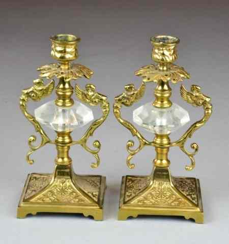 Appraisal: Pr Of Brass And Glass CandlesticksDecorated cups with center faceted