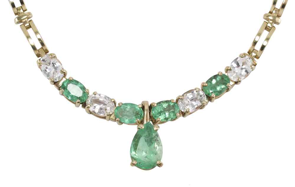 Appraisal: K EMERALD AND SAPPHIRE NECKLACE AND PENDANT ENHANCER One pear