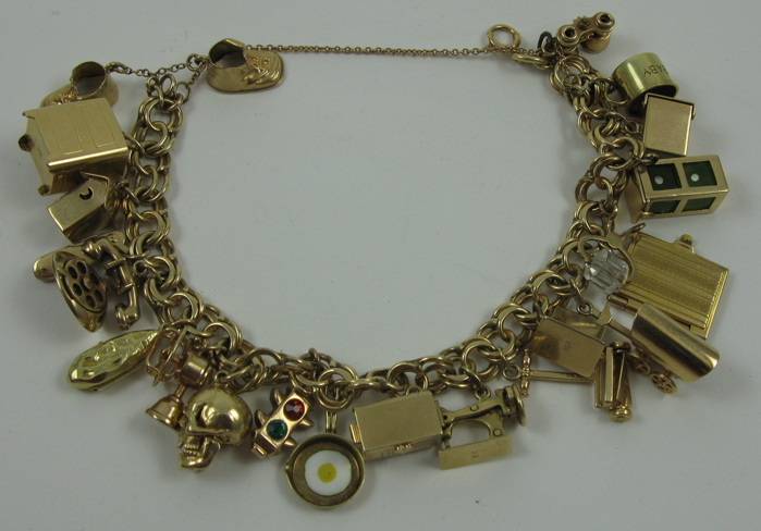 Appraisal: GOLD CHARM BRACELET K and K gold the chain bracelet