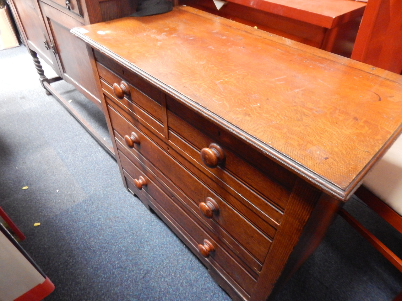 Appraisal: A Victorian oak grain painted pine chest of drawers having