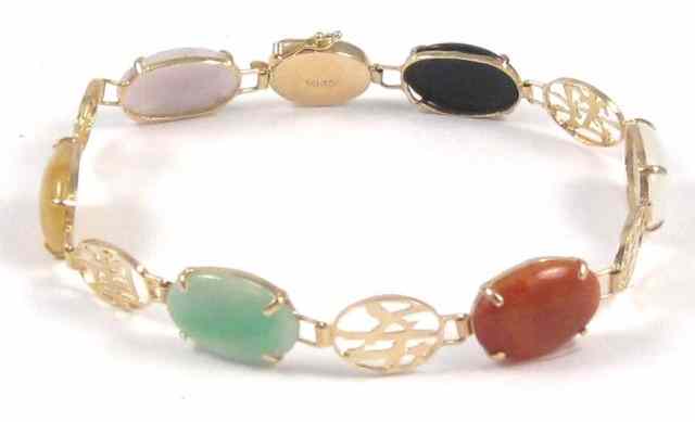 Appraisal: MULTI-COLOR JADE BRACELET with green yellow white orange and black