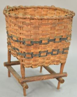 Appraisal: Woven splint basket with light blue paint on stretcher base