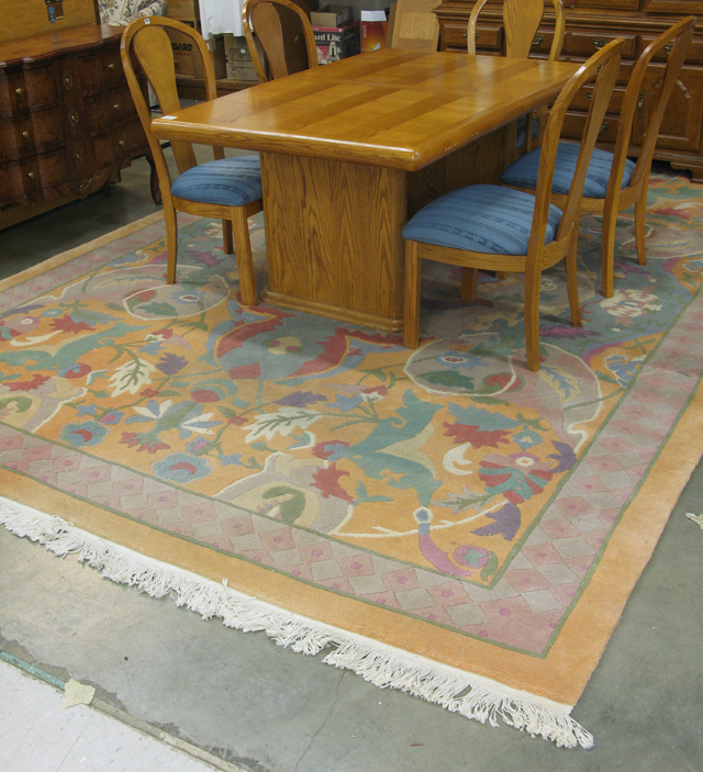 Appraisal: CONTEMPORARY HAND KNOTTED WOOL CARPET overall stylized Tibetan floral design