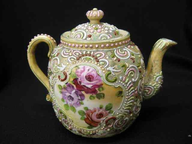 Appraisal: Japanese Moriage Porcelain Teapot handpainted floral signed