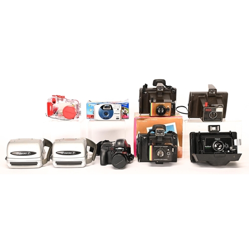 Appraisal: Eight Olympus Polaroid and other cameras More Information Sold as