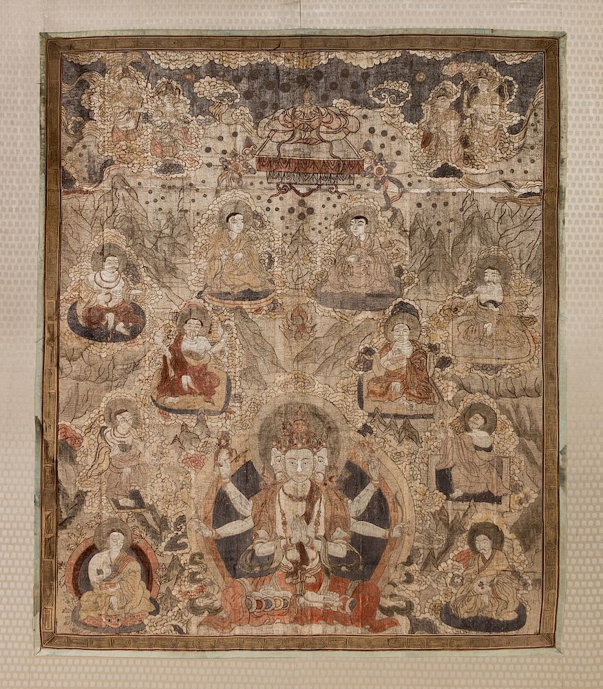 Appraisal: A Tibetan Silk and Metallic Thread-Embroidered Thangka A Tibetan Silk