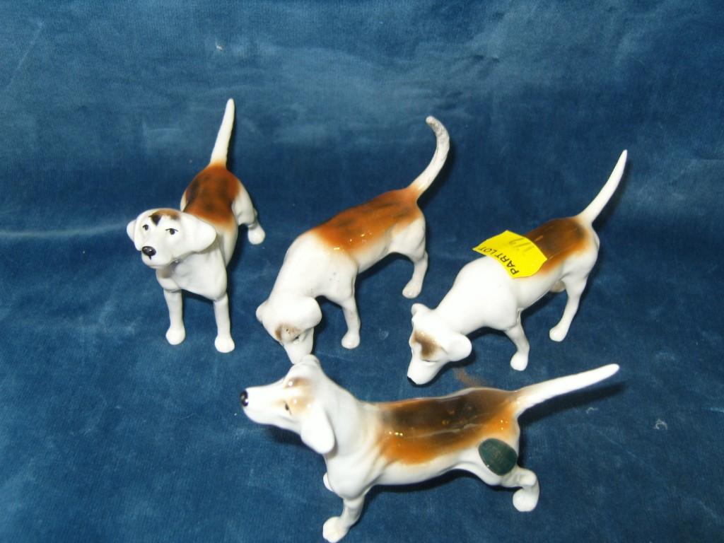 Appraisal: A collection of four Beswick hounds in different positions