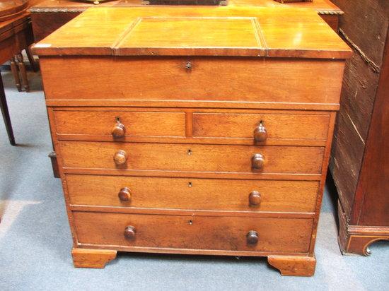 Appraisal: A VICTORIAN MAHOGANY CAMPAIGN DESK the sliding top with hinged