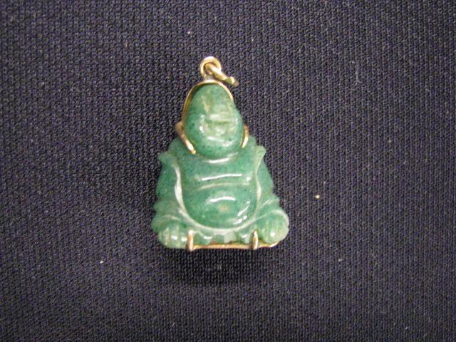 Appraisal: Carved Jade Pendant of a Buddha k yellow gold