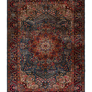 Appraisal: A Kirman Wool Rug Circa s feet inches x feet