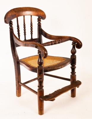 Appraisal: A child's Victorian chair with foot support and caned seat