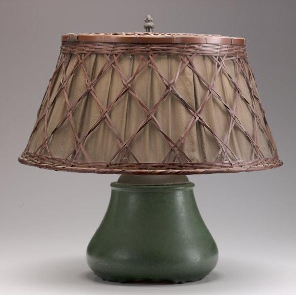 Appraisal: HAMPSHIRE Factory lamp base covered in matte green glaze Complete