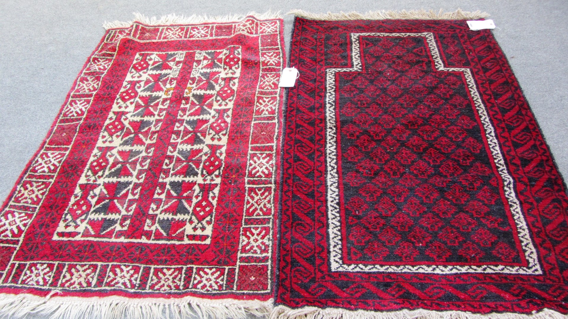 Appraisal: An Afghan Beluche prayer rug the black mehrab with diagonal