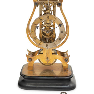 Appraisal: A Brass Lyre-Form Skeleton Clock th Century having a Roman