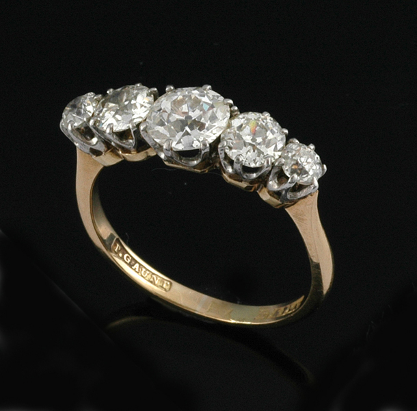 Appraisal: A FIVE STONE DIAMOND RING Centrally set with an early