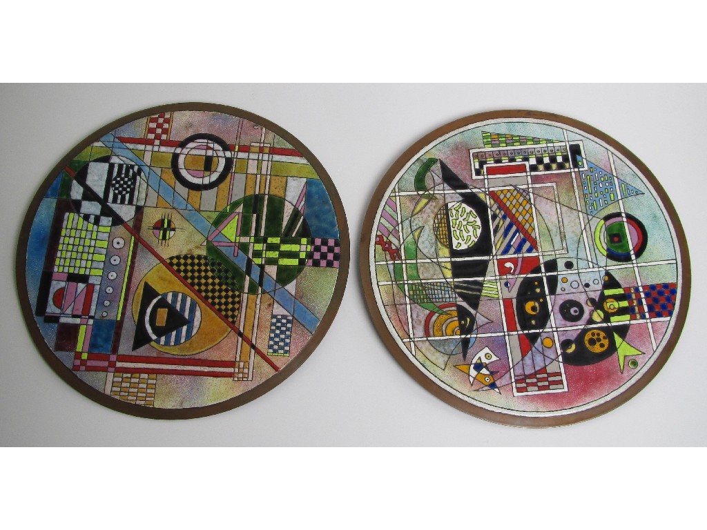 Appraisal: A pair of Vasily Kandinsky style enamel and copper circular