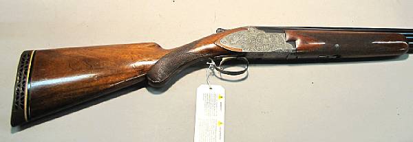 Appraisal: A customized gauge Belgian Browning superposed shotgun Serial no for