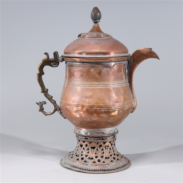 Appraisal: Antique Indian copper ewer with incised concentric circles to body