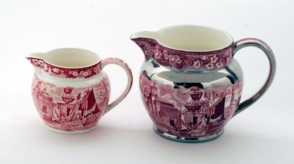 Appraisal: Two Wedgwood Ferrara pitchers larger with silver luster trim marked