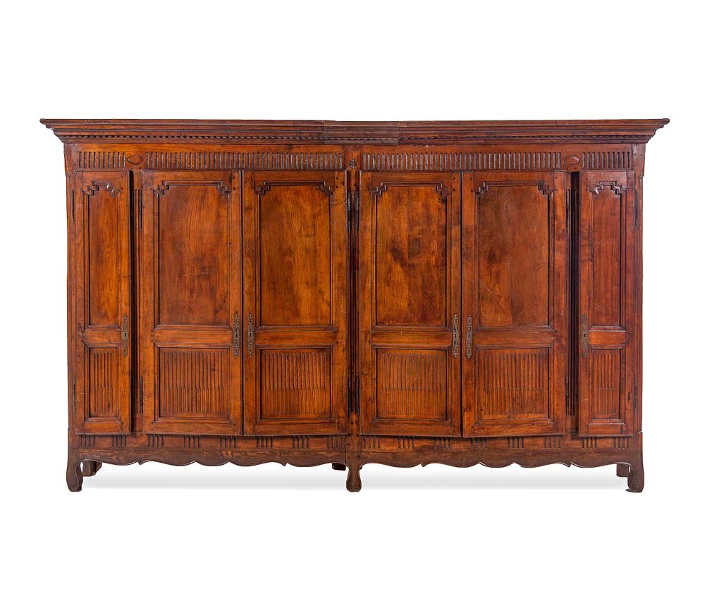 Appraisal: A French Provincial Walnut Bibliotheque A French Provincial Walnut Bibliotheque