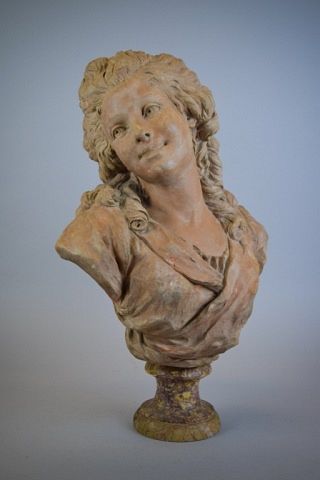 Appraisal: Terra Cotta Bust of a Woman On marble base Unsigned