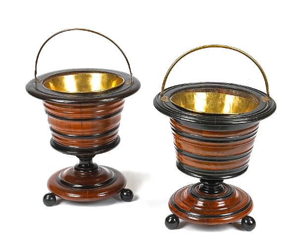 Appraisal: Two similar Dutch mahogany parcel ebonized and brass wine coolers