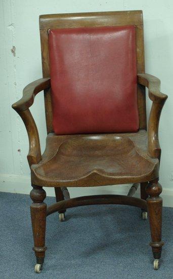 Appraisal: A th Century elm open armchair the back inset an