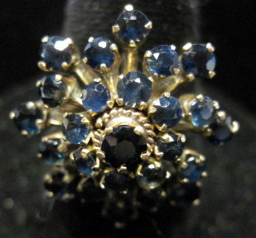 Appraisal: karat gold and sapphire cluster ring ring size dwt