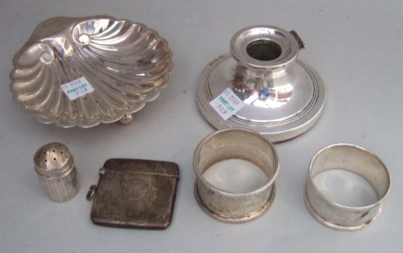 Appraisal: Mostly silver comprising a butter shell two napkin rings a