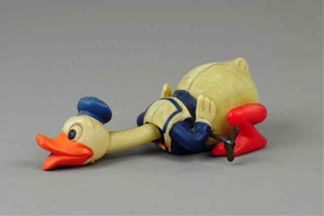 Appraisal: CRAWLING DONALD DUCK Occupied Japan example celluloid body short bill