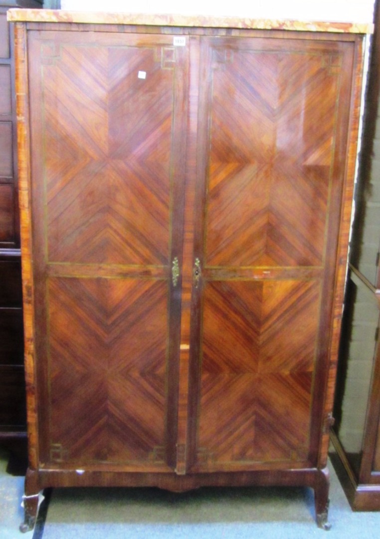 Appraisal: A Louis XV style inlaid kingwood armoire the marble top