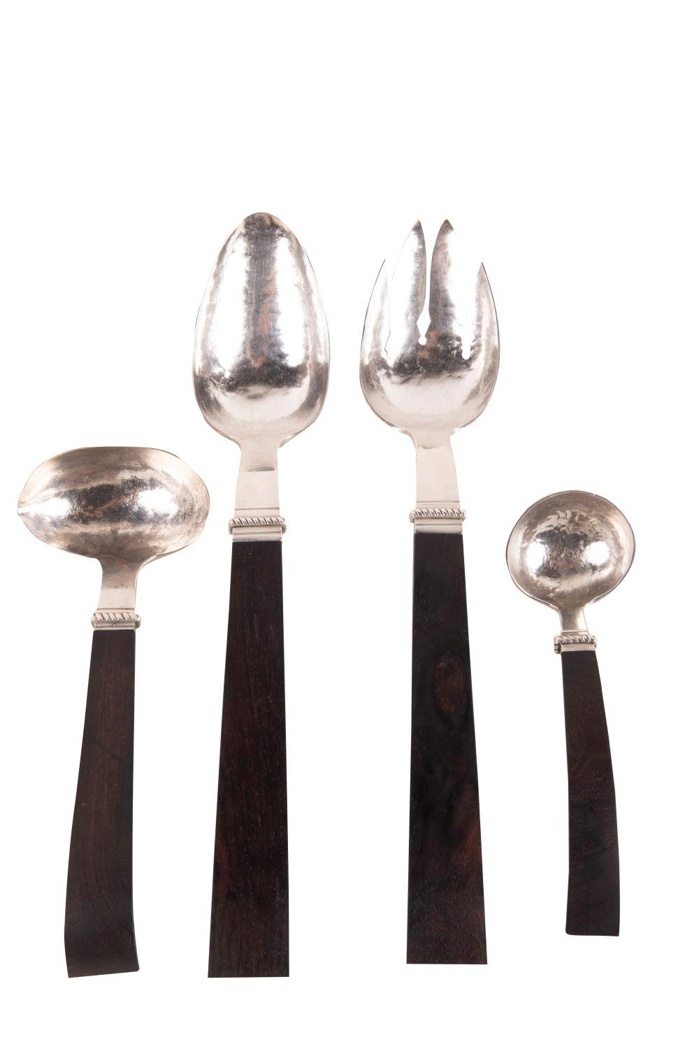 Appraisal: FOUR SPRATLING STERLING WOOD SERVING PIECEScomprising a salad set in