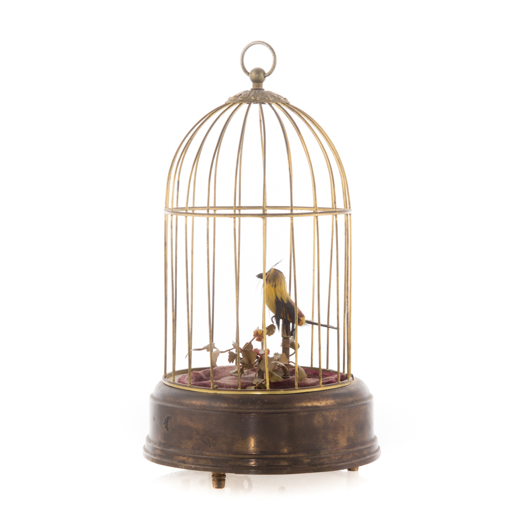 Appraisal: German caged bird automaton circa s songbird in brass cage