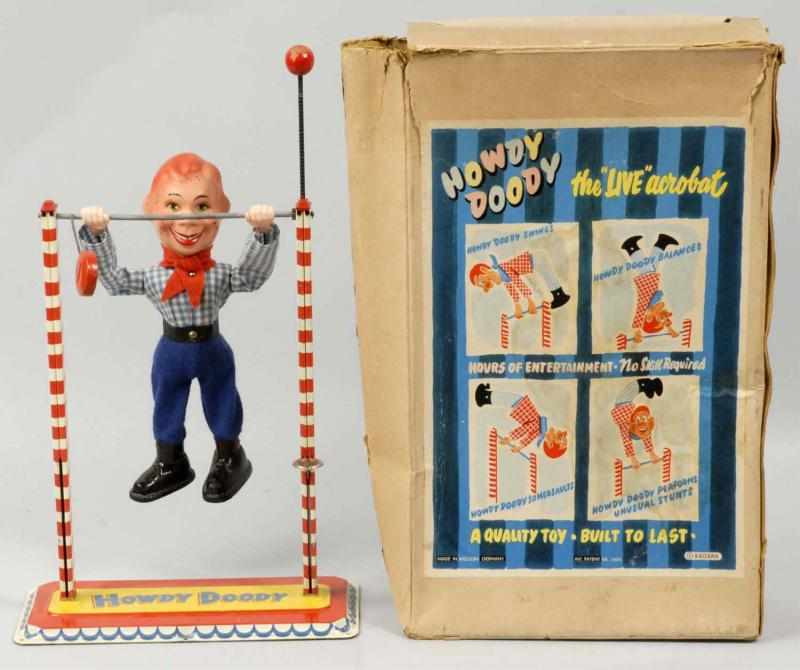 Appraisal: Tin Howdy Doody Acrobat Toy Description German Bottom of toy