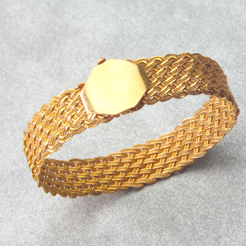 Appraisal: Woven gold mesh bracelet with bayonet clasp in k gold