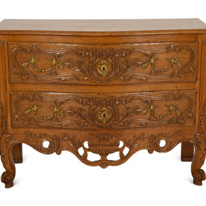 Appraisal: A French Provincial Carved Oak Commode th Century Height x