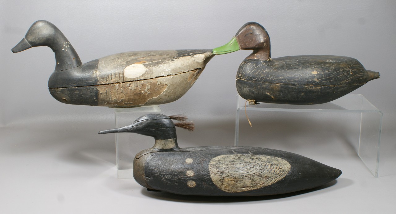 Appraisal: carved duck decoys Gene Hendrickson unknown some repaint and losses