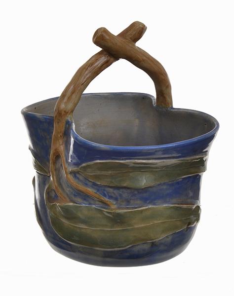 Appraisal: CHARLES DREW BASKET WITH APPLIED GUM LEAF AND A BRANCH