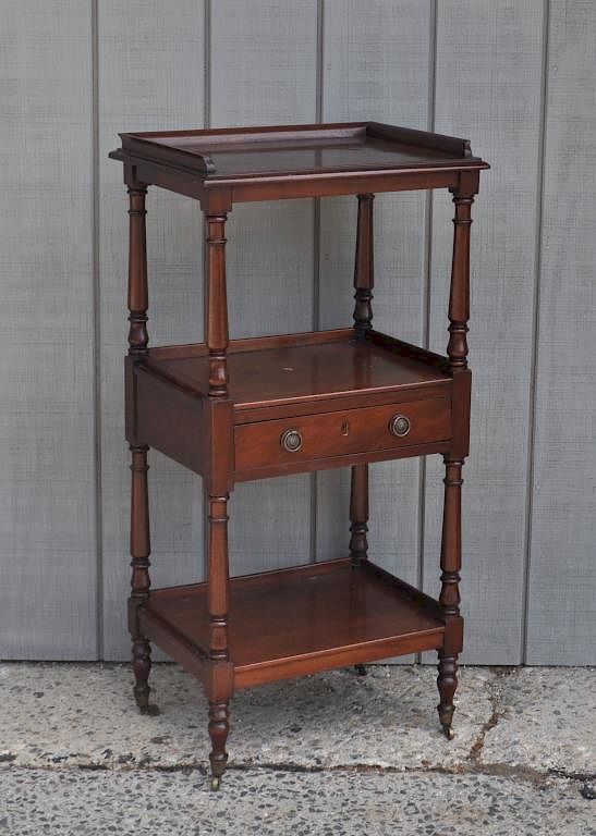 Appraisal: George III Mahogany Etagere with one drawer on casters Finish