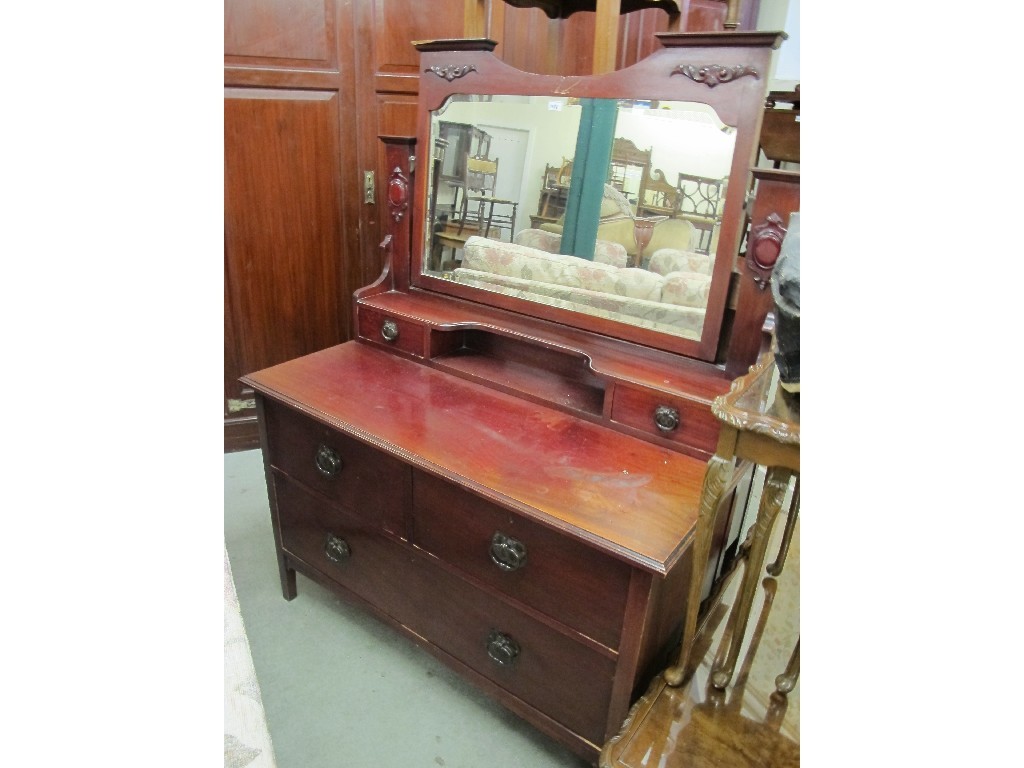 Appraisal: Arts and Crafts dressing chest with a similar cupboard chest